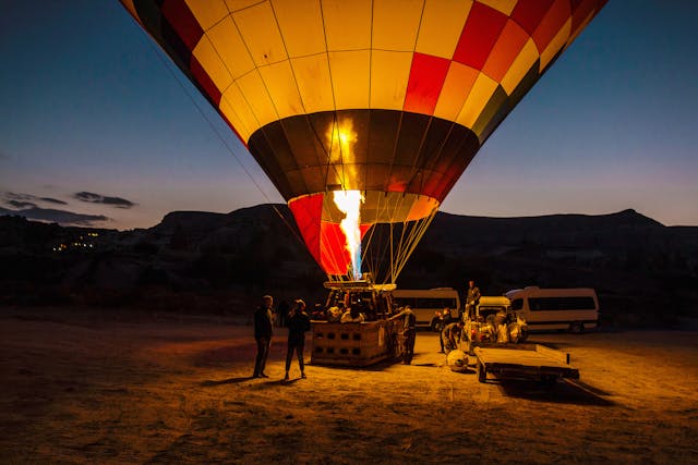 people-standing-near-a-hot-air-balloon