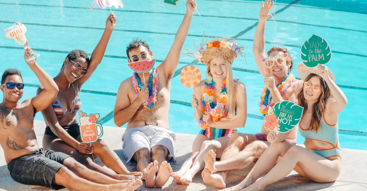 people-having-fun-while-sitting-on-the-poolside